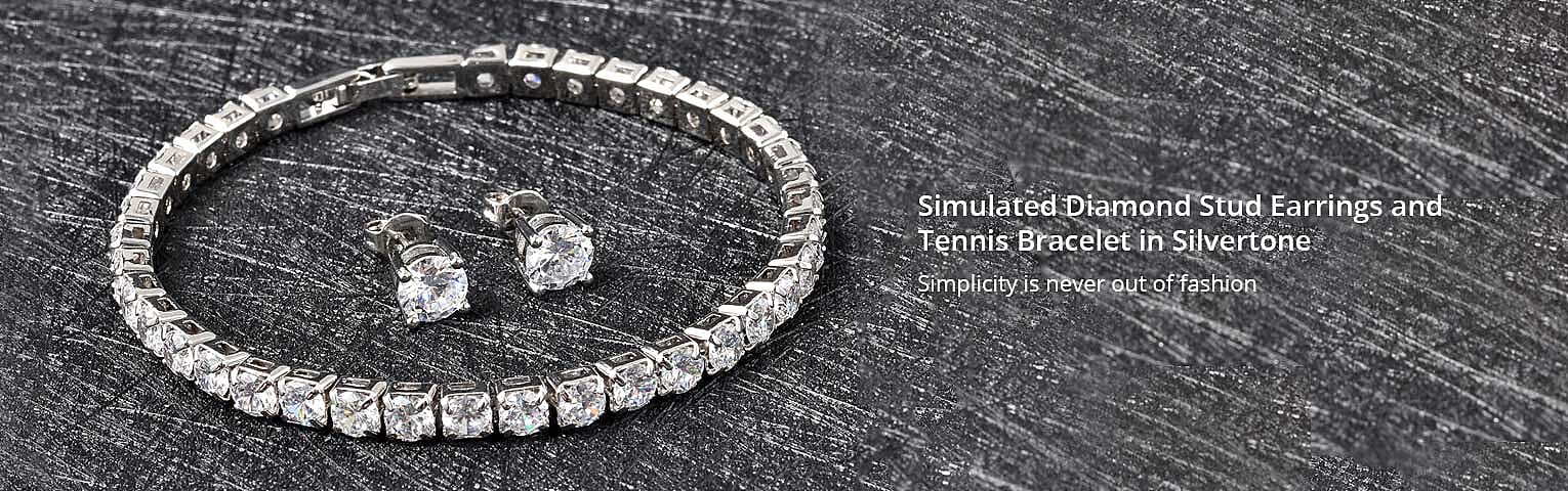 Simulated Diamond Stud Earrings and Tennis Bracelet Banner