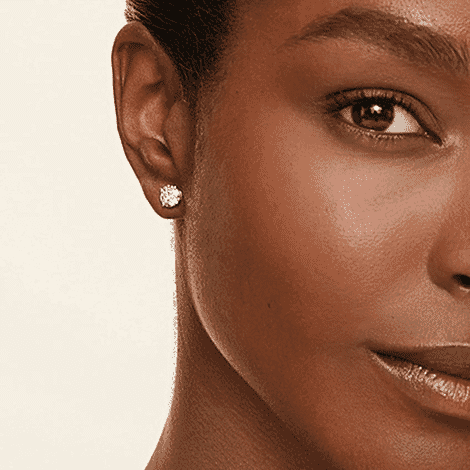 A pair of gold earrings