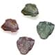 Four Bekily color change garnet rough cut gemstone pieces.