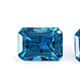 Cambodian blue zircon set of two cushion shape gemstones.