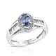Ceylon blue sapphire halo ring with side stones in sterling silver.
