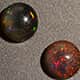 Ethiopian Sable opal round shaped gemstones.