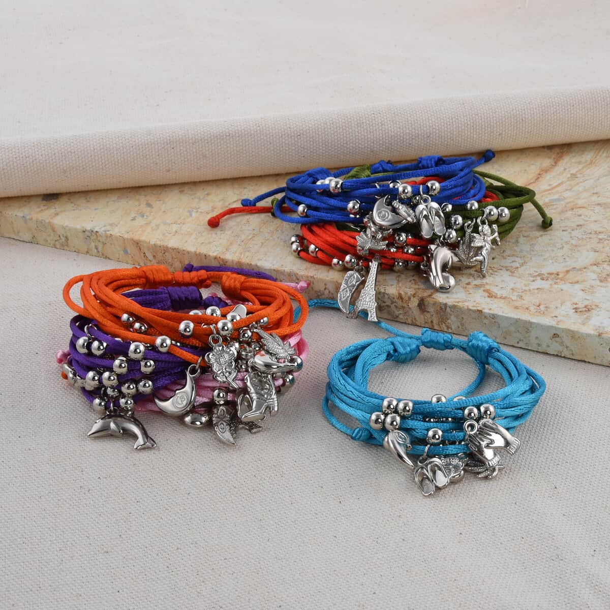 Multi Color Set of 7 Charm Bracelets (Adjustable) image number 1
