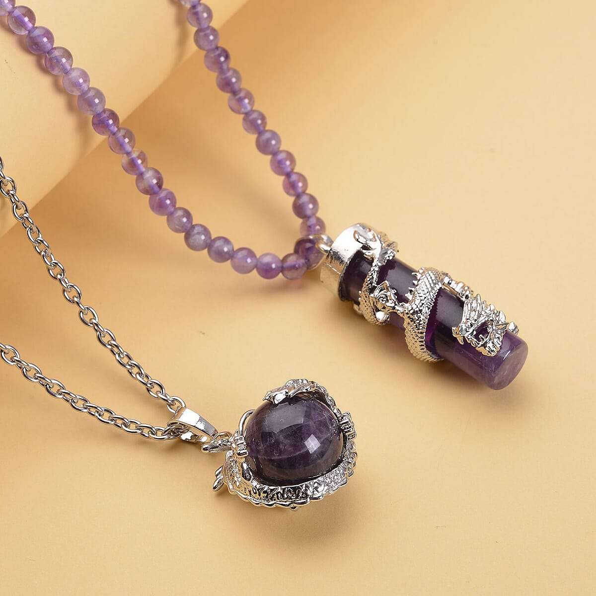 Amethyst Dragon Sphere Pendant Necklace (20 Inches) and Beaded Dragon Scroll Necklace (20-22 Inches) in Silvertone & Stainless Steel 176.25 ctw , Tarnish-Free, Waterproof, Sweat Proof Jewelry image number 1