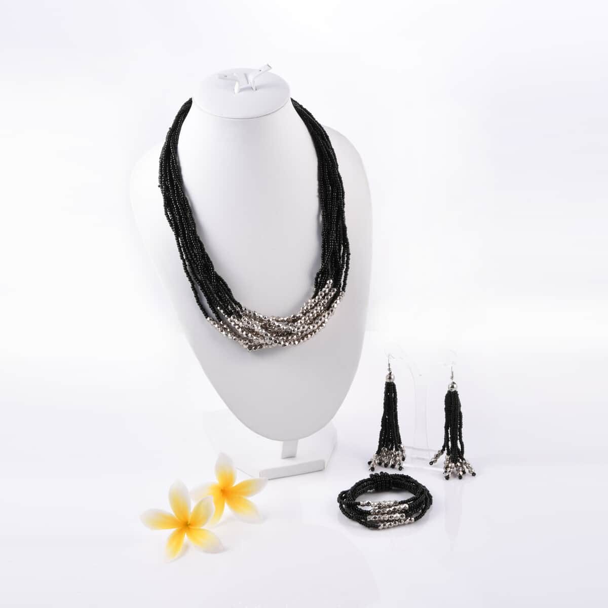 Black Seed Beaded Earrings, Stretch Bracelet and Multi Strand Necklace 22 Inches in Silvertone image number 4