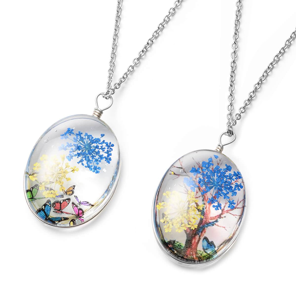 Set of 2 Pressed Flowers, Butterfly and Tree Pendant Necklace 24 Inches in Silvertone and Stainless Steel image number 0