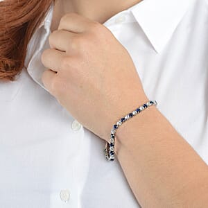 Simulated Blue and White Diamond Tennis Bracelet in Silvertone (8.00 In)
