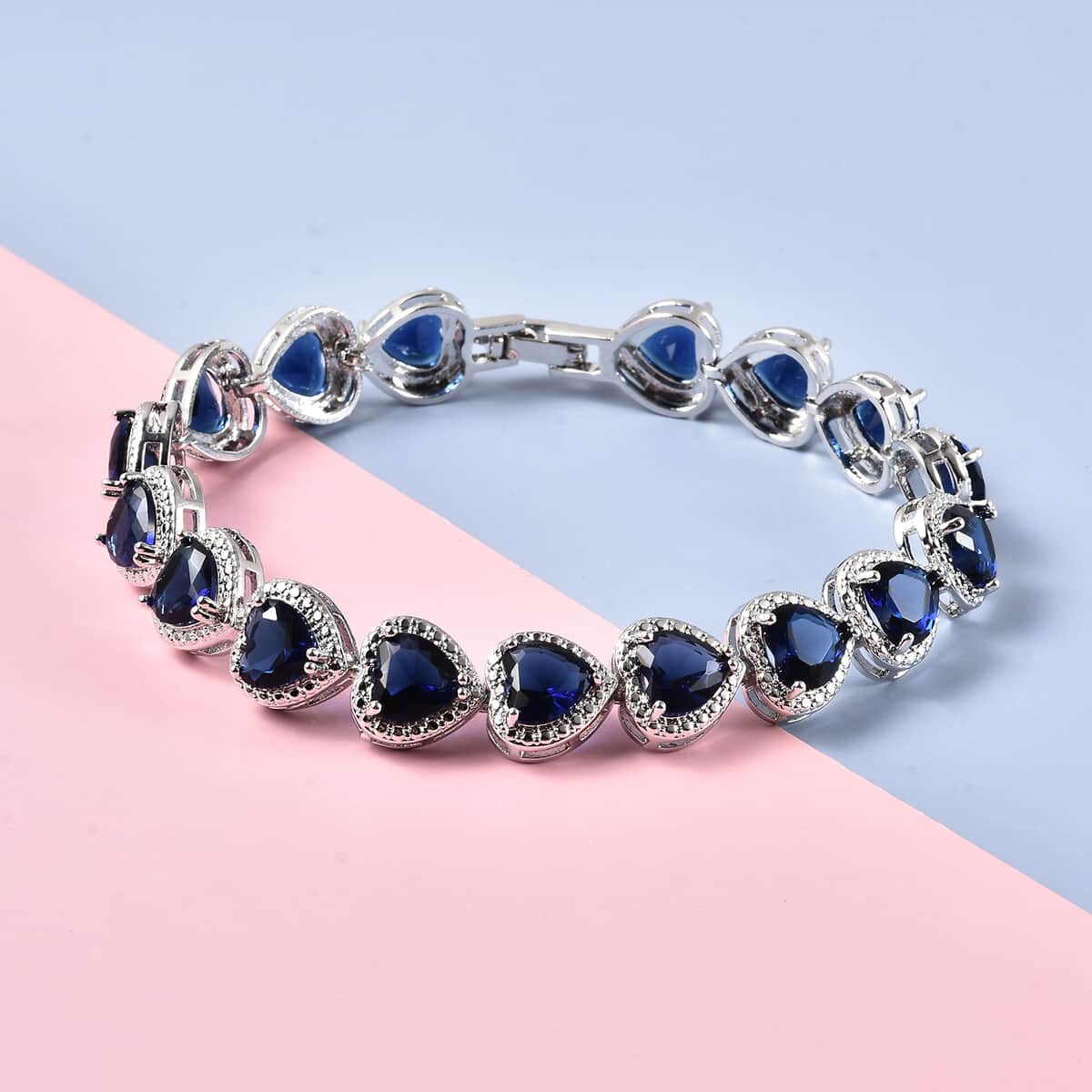 Simulated Blue Diamond Heart Bracelet in Silvertone (7.00 In) image number 1
