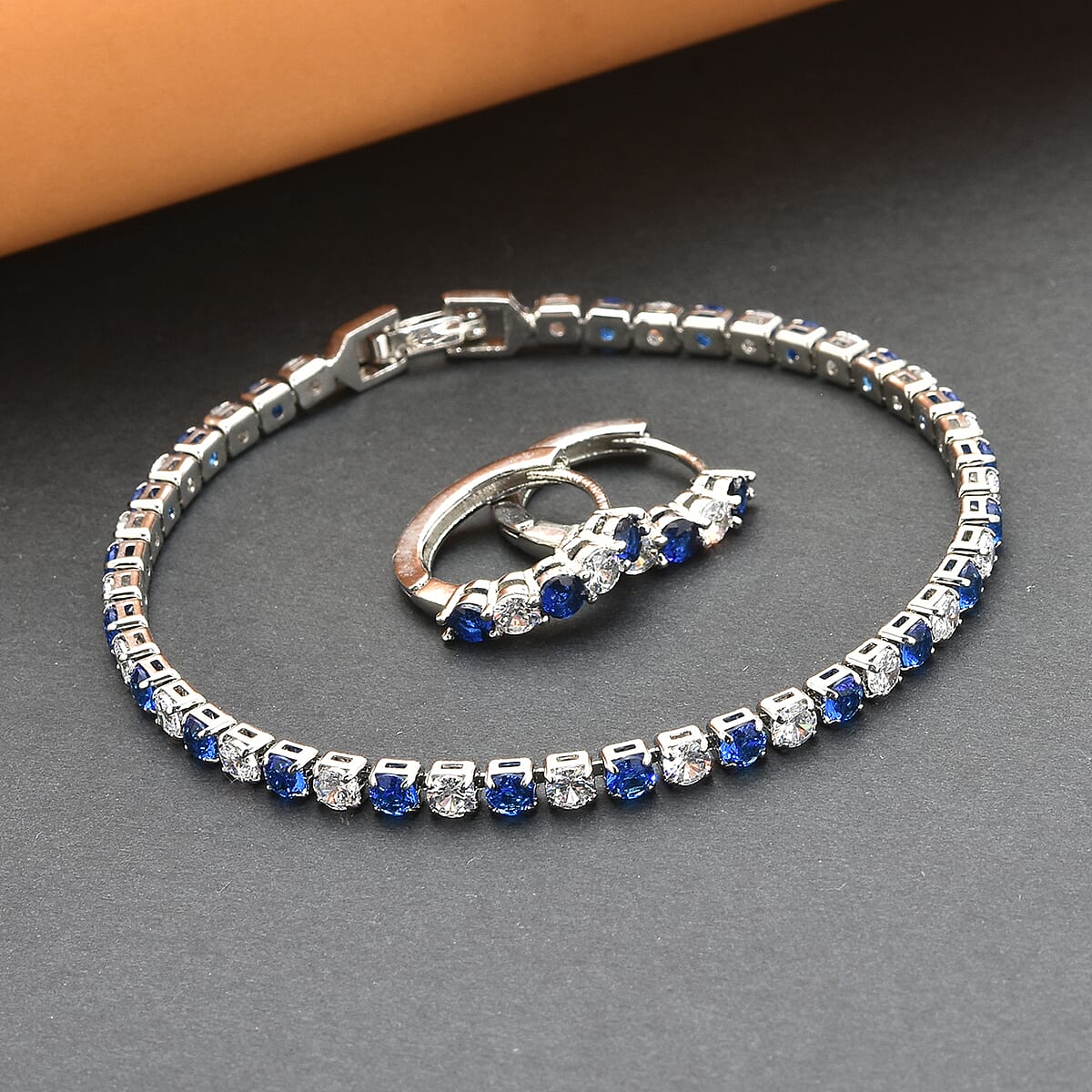 Lab Created Blue Sapphire and Simulated Diamond Tennis Bracelet (7.00 In) and Huggie Earrings in Silvertone image number 1