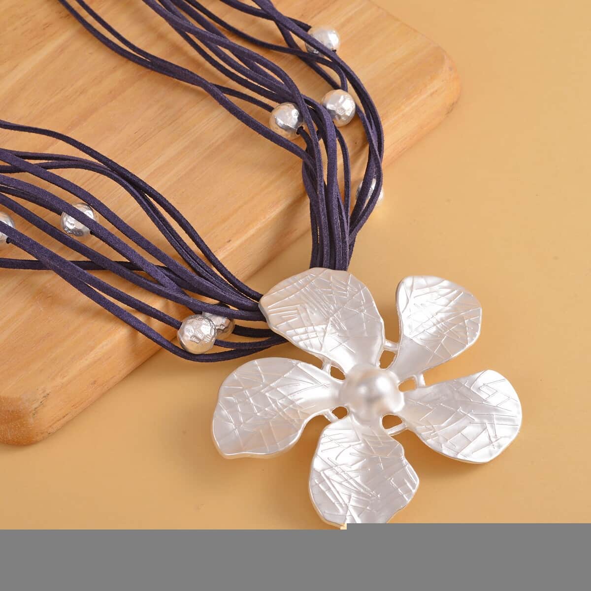 Jasmine Flower Pendant Necklace0 in Silvertone on Navy Multi Strand Faux Leather 20-23 Inches image number 1