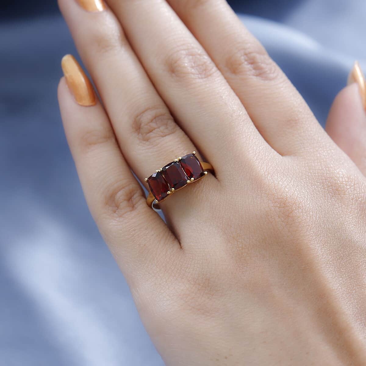 Mozambique Garnet Trilogy Ring in 14K Yellow Gold Over Sterling Silver (Size 6.0) 3.00 ctw image number 2