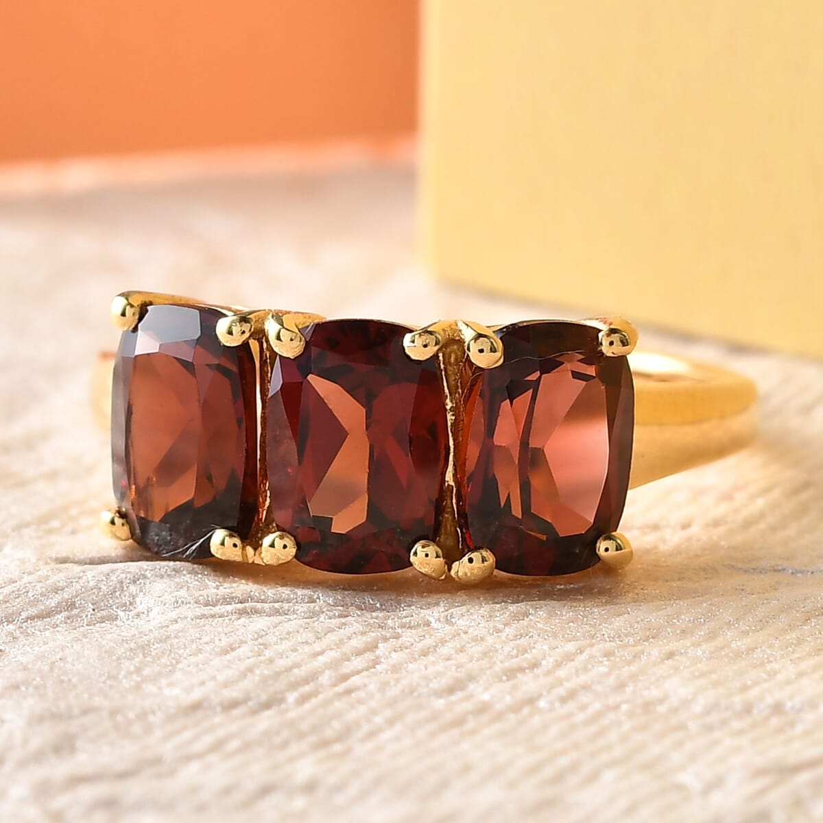Mozambique Garnet 3.00 ctw Trilogy Ring in 14K Yellow Gold Over Sterling Silver (Size 9.0) image number 1