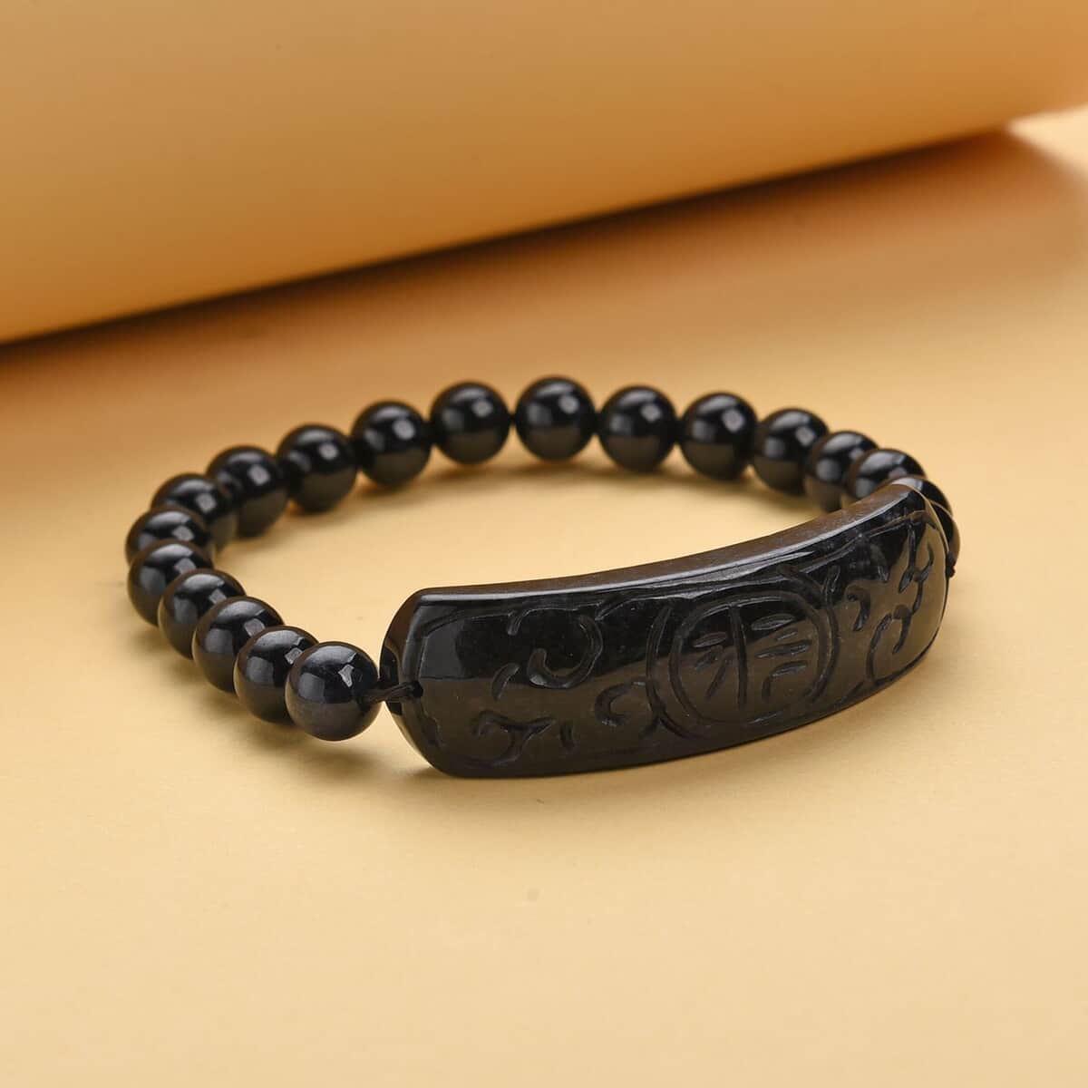 Black Jade (D) Bead Stretch Bracelet, Ancient Coin Detail Carved Bar Bracelet 141.00 ctw image number 1