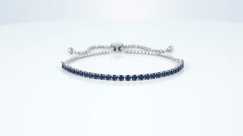 Simulated Blue Diamond Earrings and Tennis Bolo Bracelet in Stainless Steel