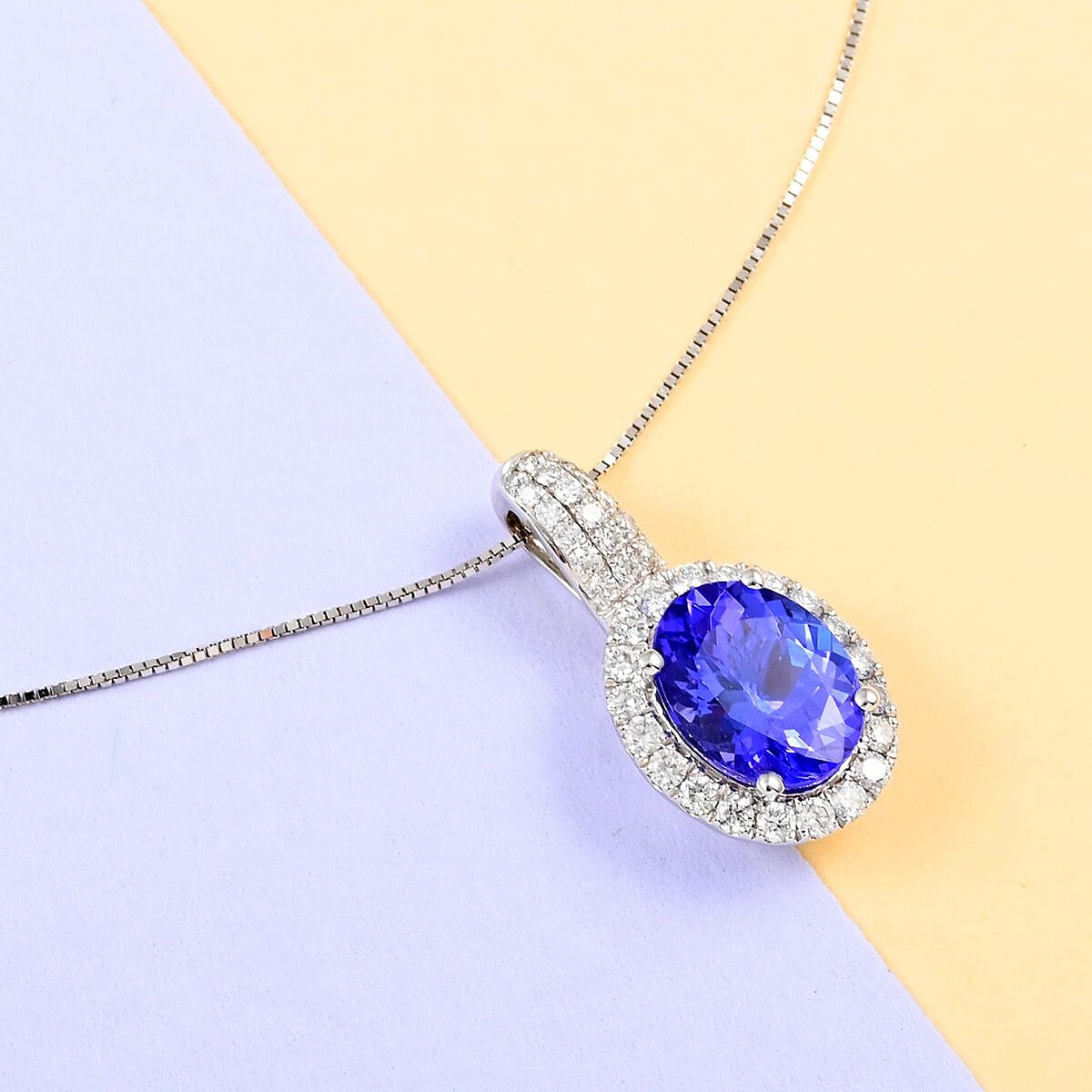 Iliana 18K White Gold AAA Tanzanite and G-H SI Diamond Halo Pendant Necklace 20 Inches 3.65 Grams 2.65 ctw image number 1