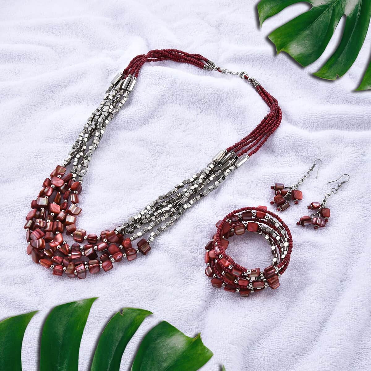 Red Shell and Seed Beaded Earrings and Wrap Bracelet and Multi Strand Necklace 22 Inches in Stainless Steel image number 1