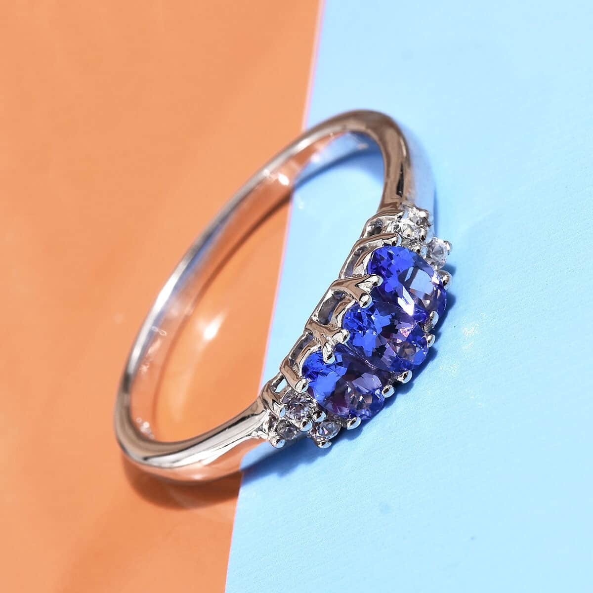 Premium Tanzanite and White Zircon Ring in Platinum Over Sterling Silver (Size 7.0) 0.85 ctw image number 1