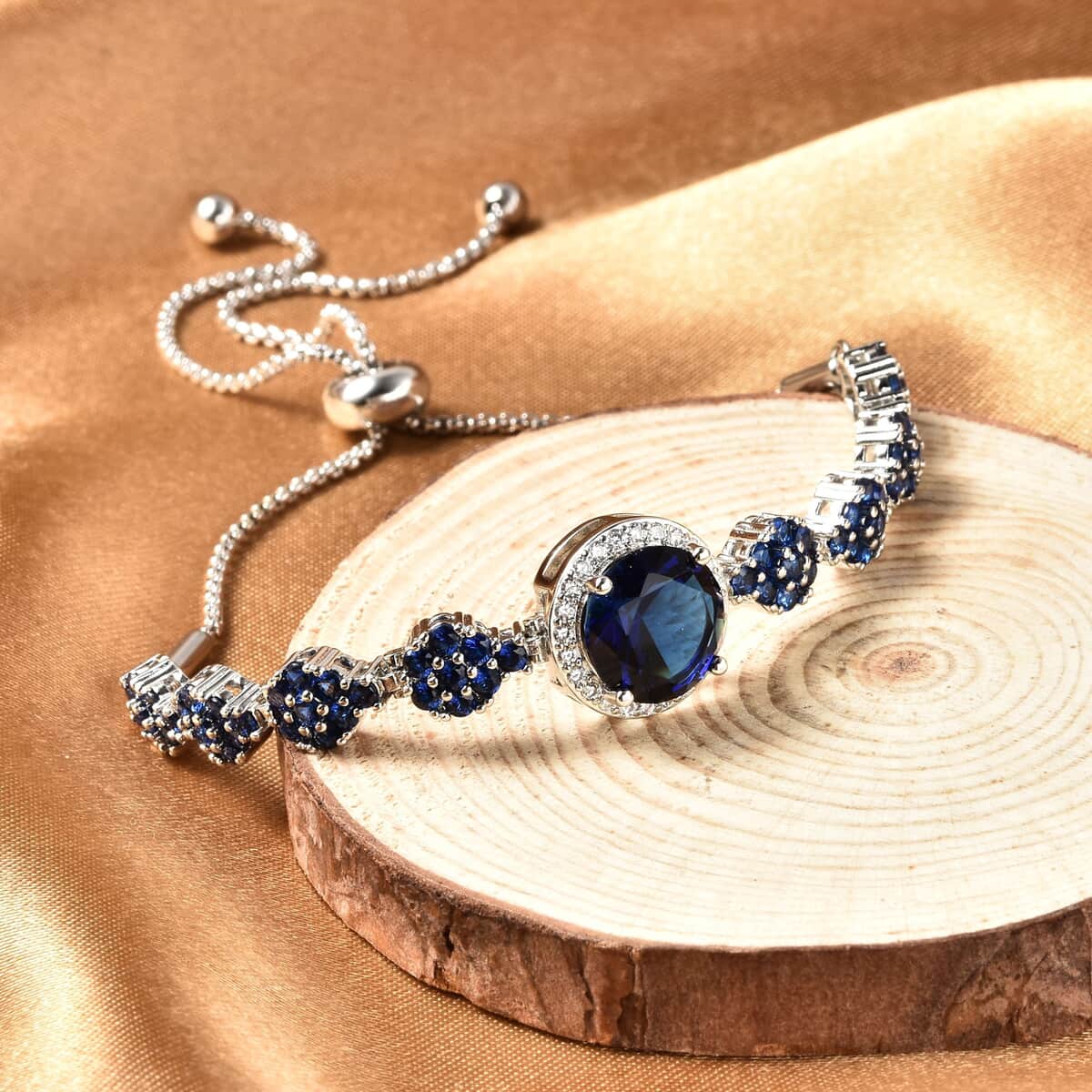Simulated Blue Sapphire and Simulated Blue and White Diamond Bolo Bracelet in Silvertone & Stainless Steel 3.00 ctw image number 1