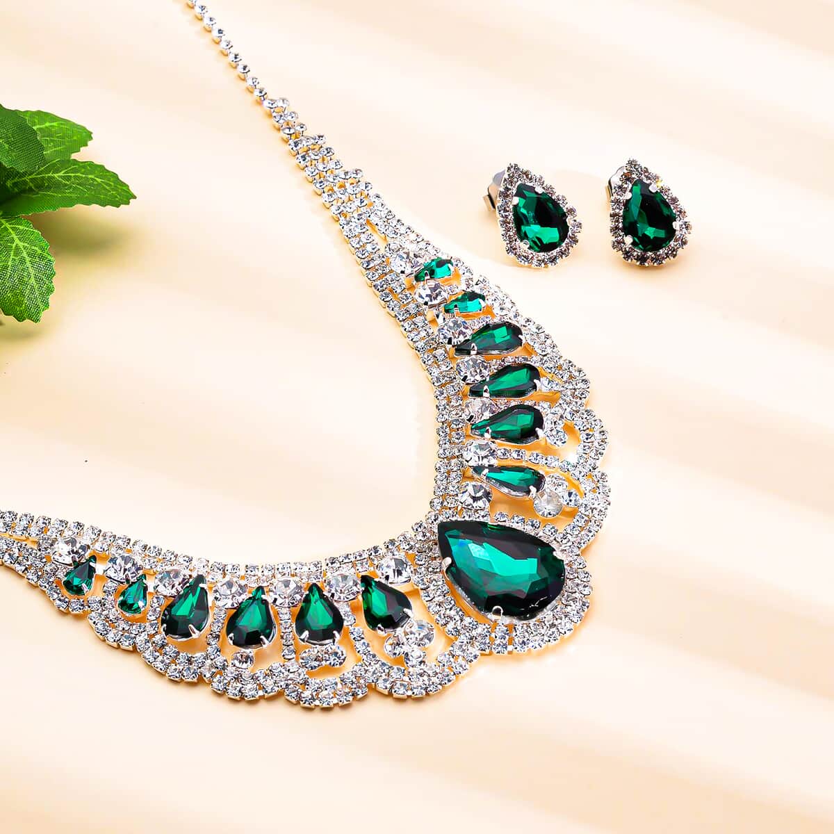 Simulated Green Sapphire and Austrian Crystal Earrings and Necklace 22 Inches in Silvertone image number 1