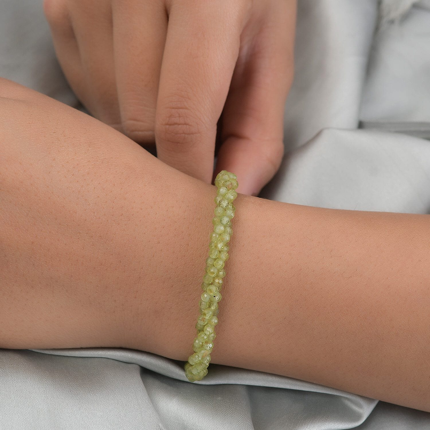 Peridot 37.25 ctw Twisted Beaded Bracelet in Sterling Silver (7.25 In)