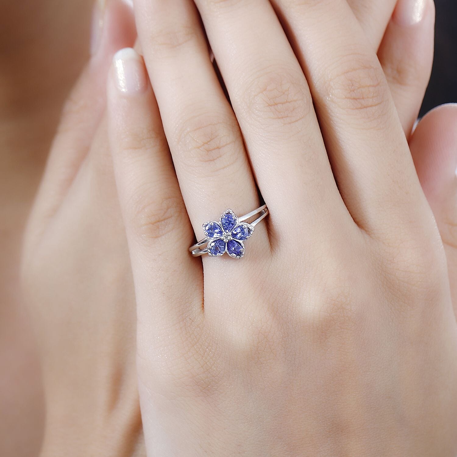 D'Joy AAA Tanzanite and White Zircon Floral Ring in Platinum Over Sterling Silver (Size 10.0) 0.75 ctw