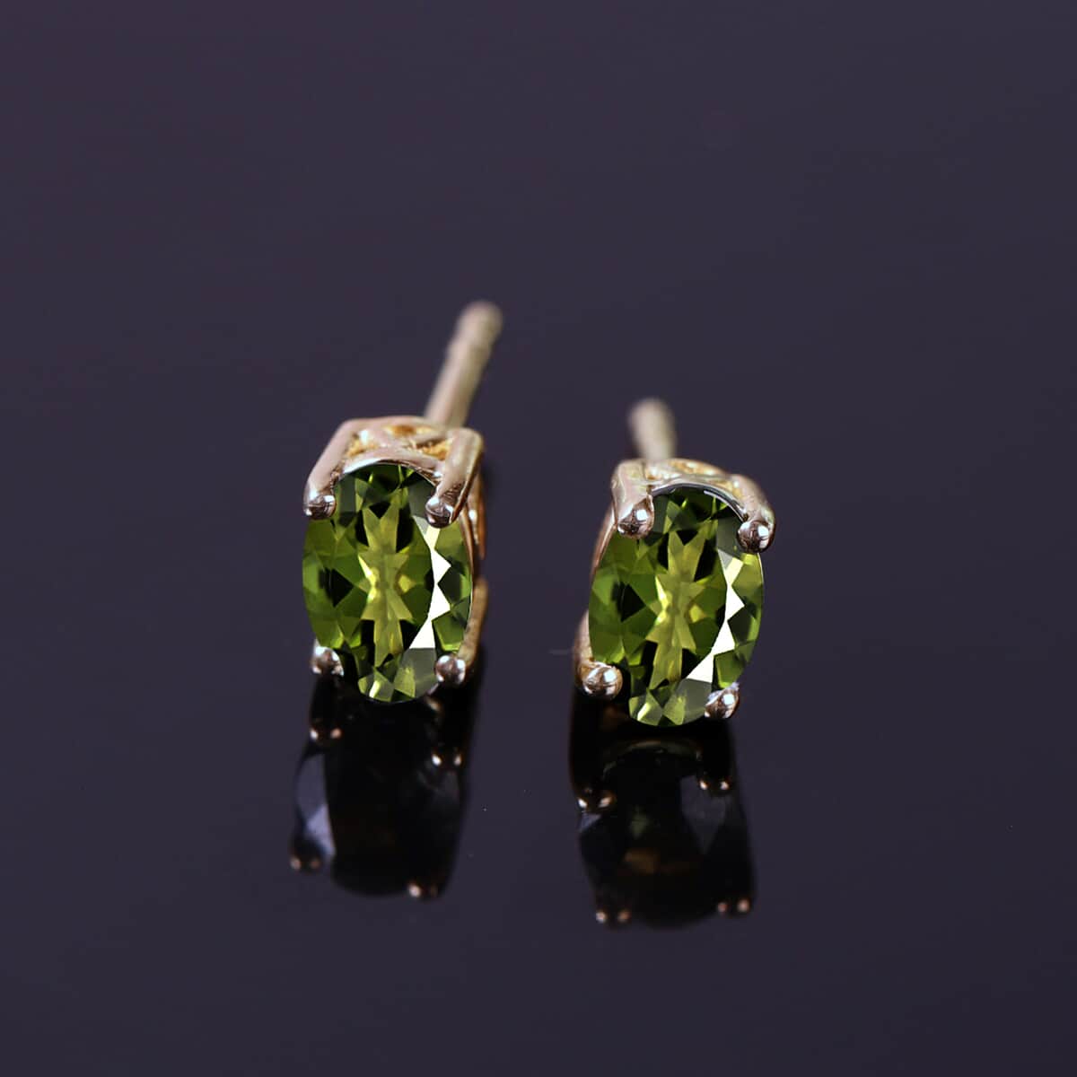 Bohemian Moldavite 0.75 ctw Solitaire Stud Earrings in Vermeil Yellow Gold Over Sterling Silver image number 1