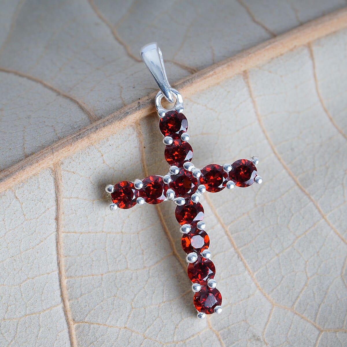 1.50 ctw Mozambique Garnet Cross Pendant in Sterling Silver image number 1