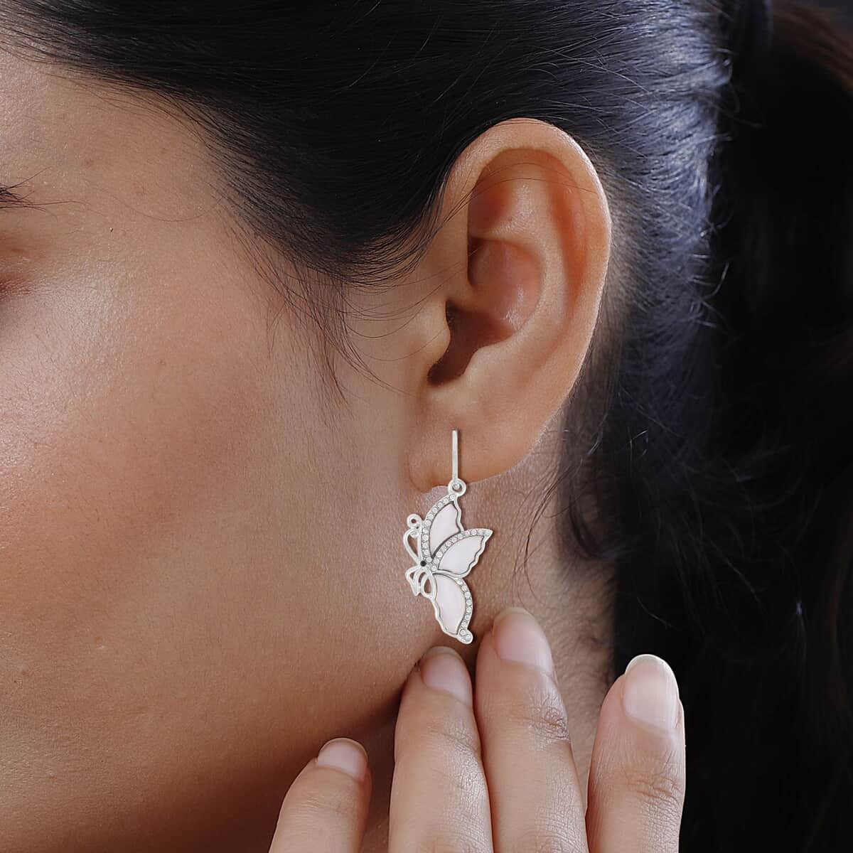 White Shell, Black and White Austrian Crystal Butterfly Earrings in Silvertone and Stainless Steel image number 2