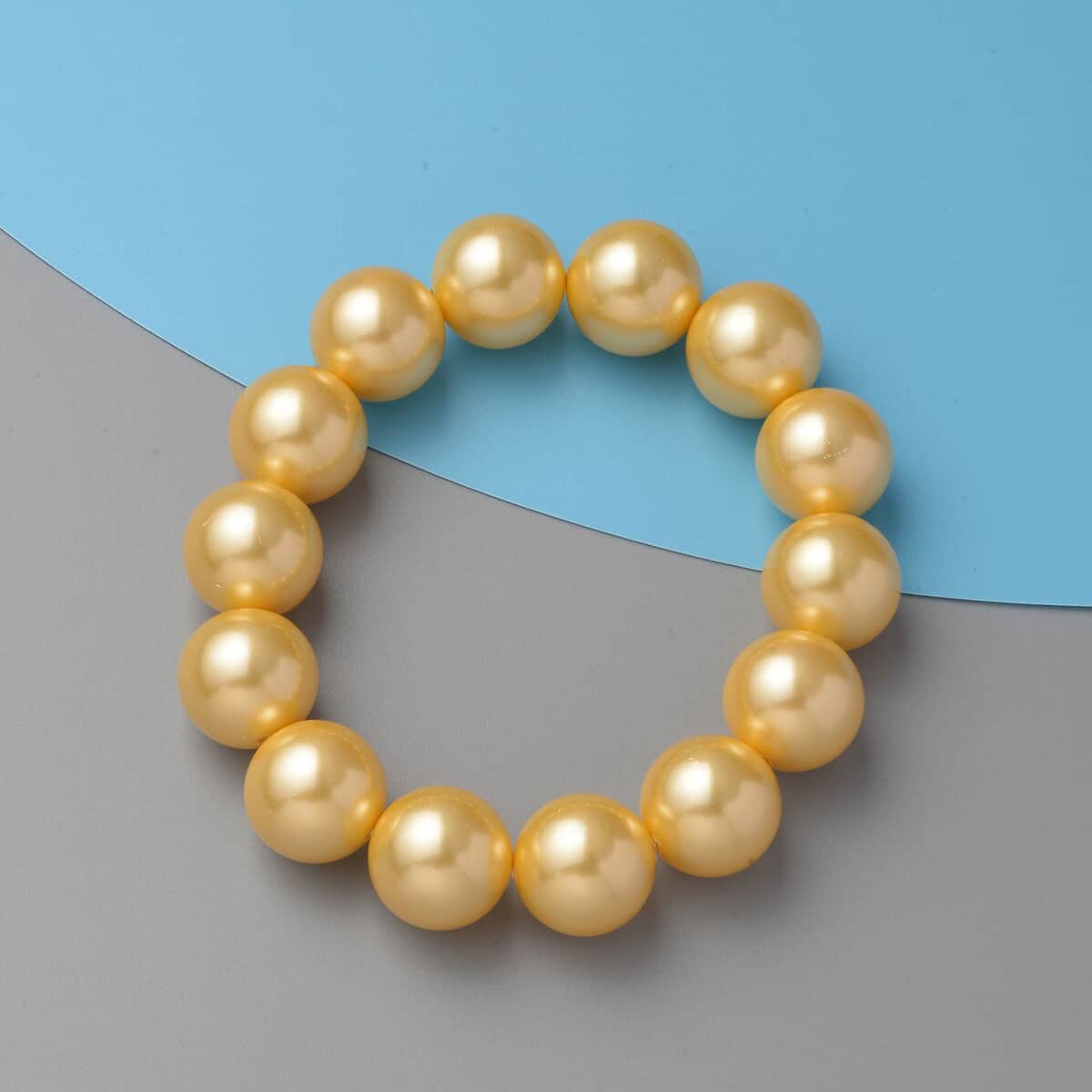 Ankur Treasure Chest Golden Color Shell Pearl Stretch Bracelet image number 1