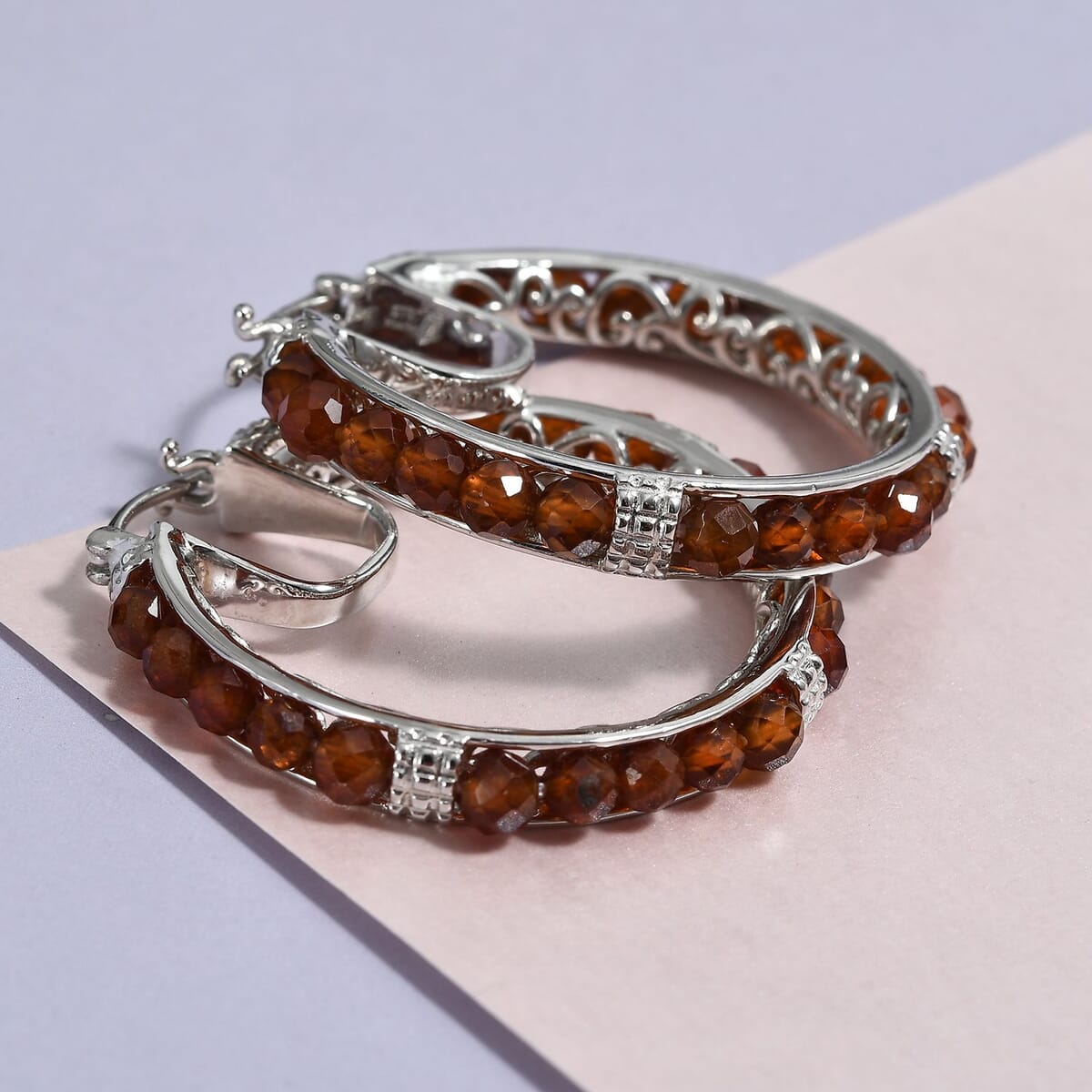 Karis Ratnapura Hessonite Garnet Faceted 25.00 ctw Hoop Earrings in Platinum Bond  image number 1