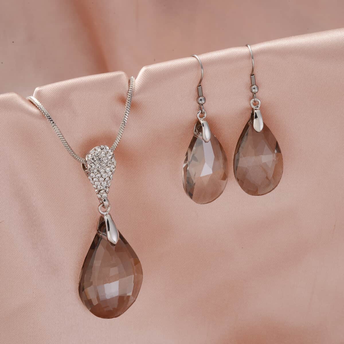 Simulated Gray Topaz and White Austrian Crystal Drop Earrings and Necklace 29 Inches in Silvertone & Stainless Steel image number 1