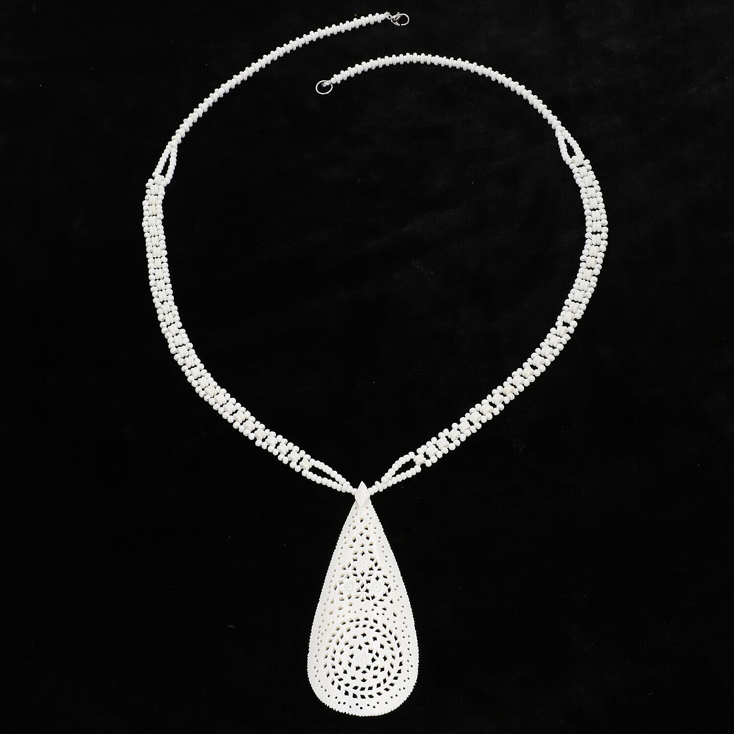 White Carved Bone Drop Necklace (18-20 Inches) in Silvertone