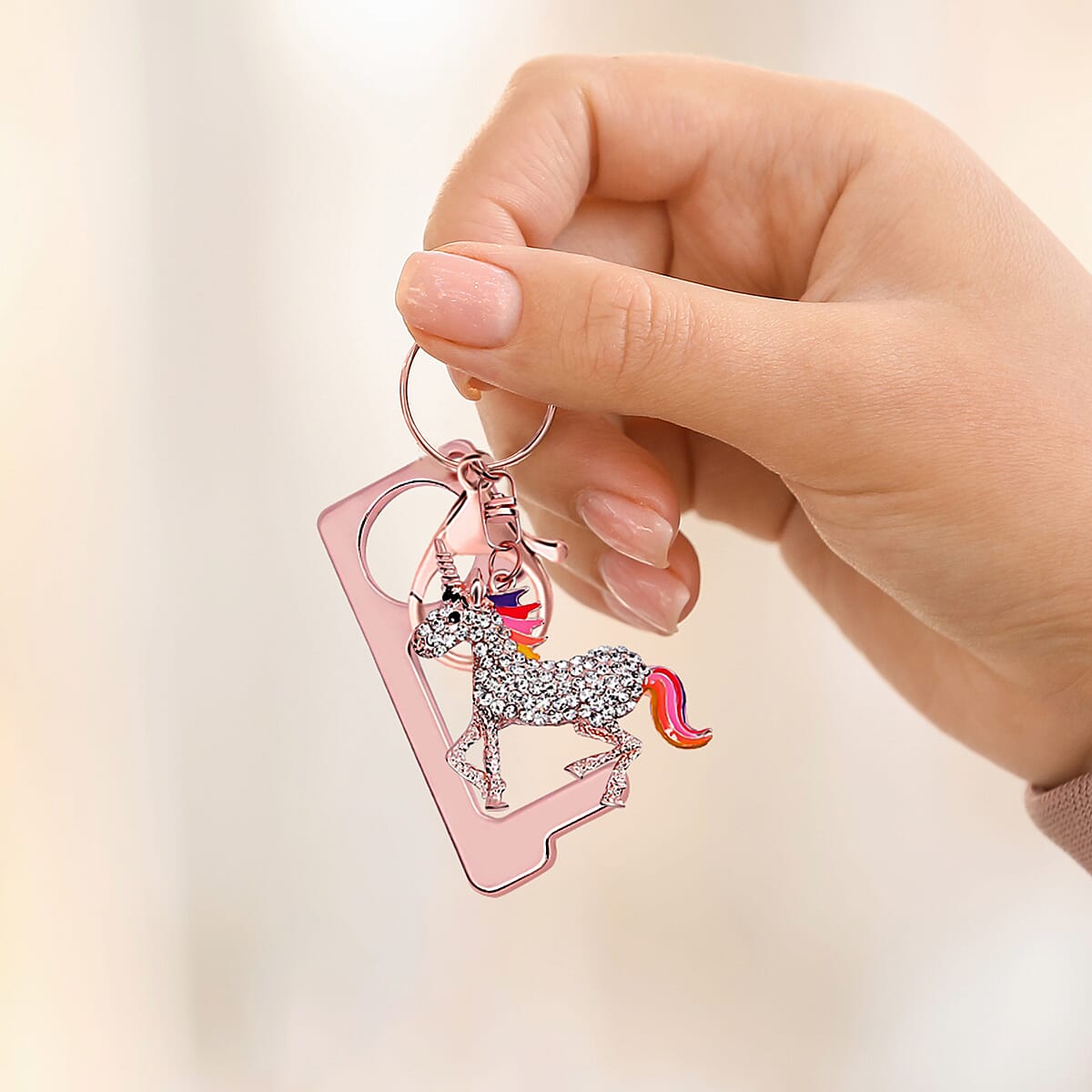 Black and White Austrian Crystal, Enameled Unicorn Key Chain with Touchless Door Opener in Rosetone image number 4