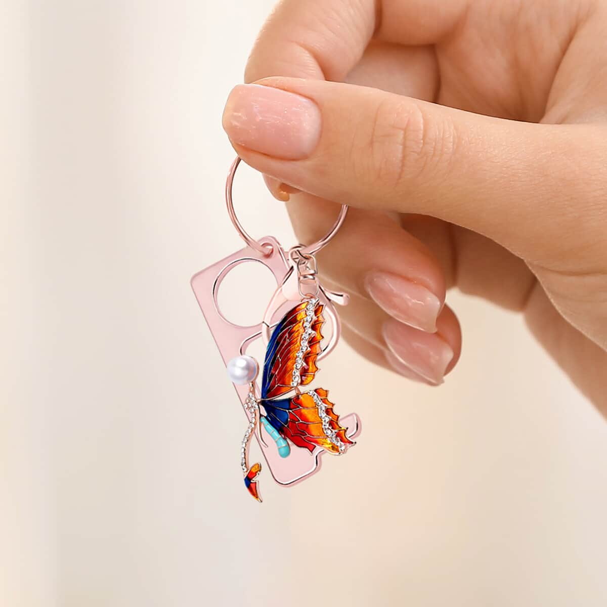 Simulated Pearl, Austrian Crystal and Enameled Butterfly Key Chain with Touchless Door Opener in Rosetone image number 4