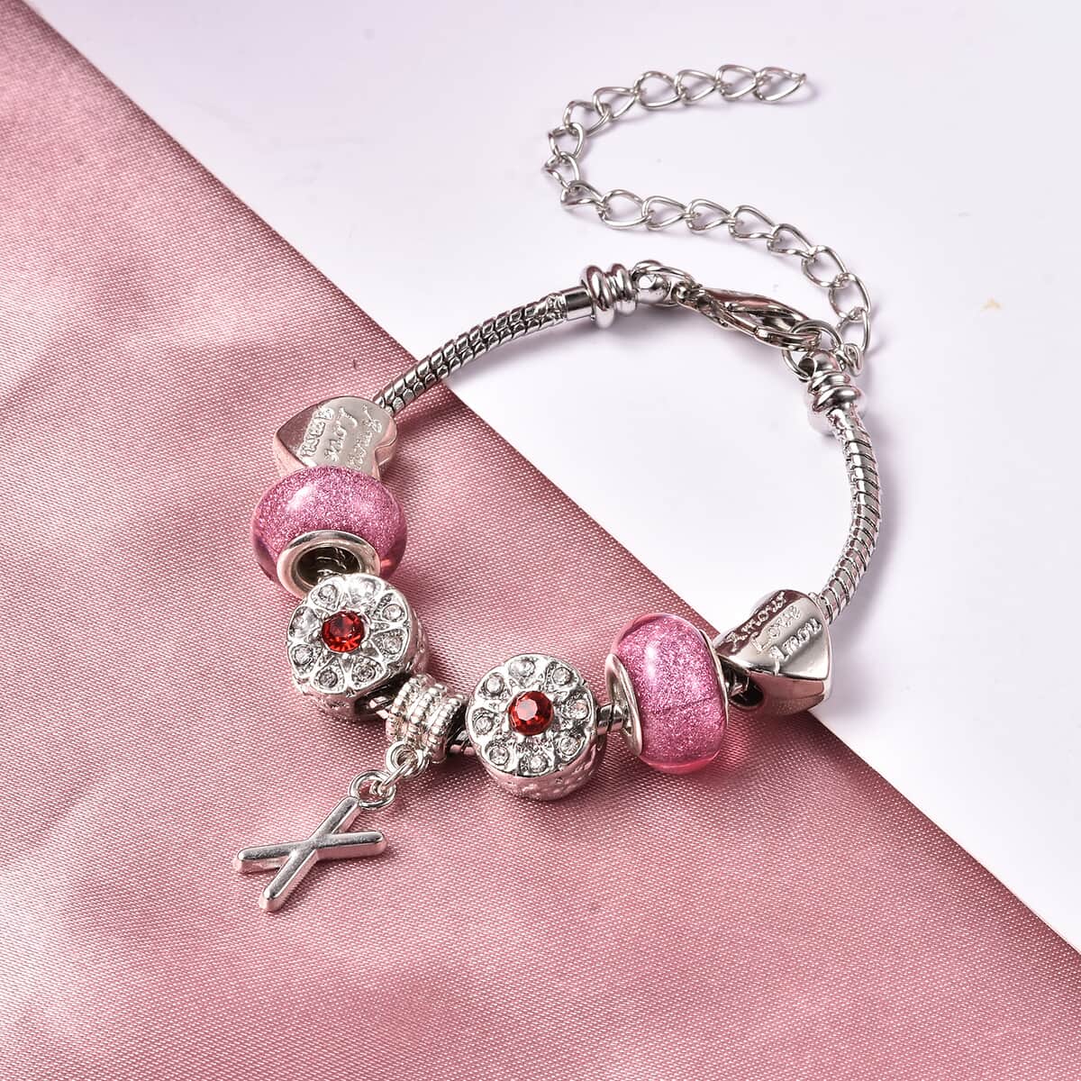 CHARMES D’JOY Red and White Austrian Crystal and Simulated Pink Color Resin Bracelet in Silvertone (6.00 In) image number 1