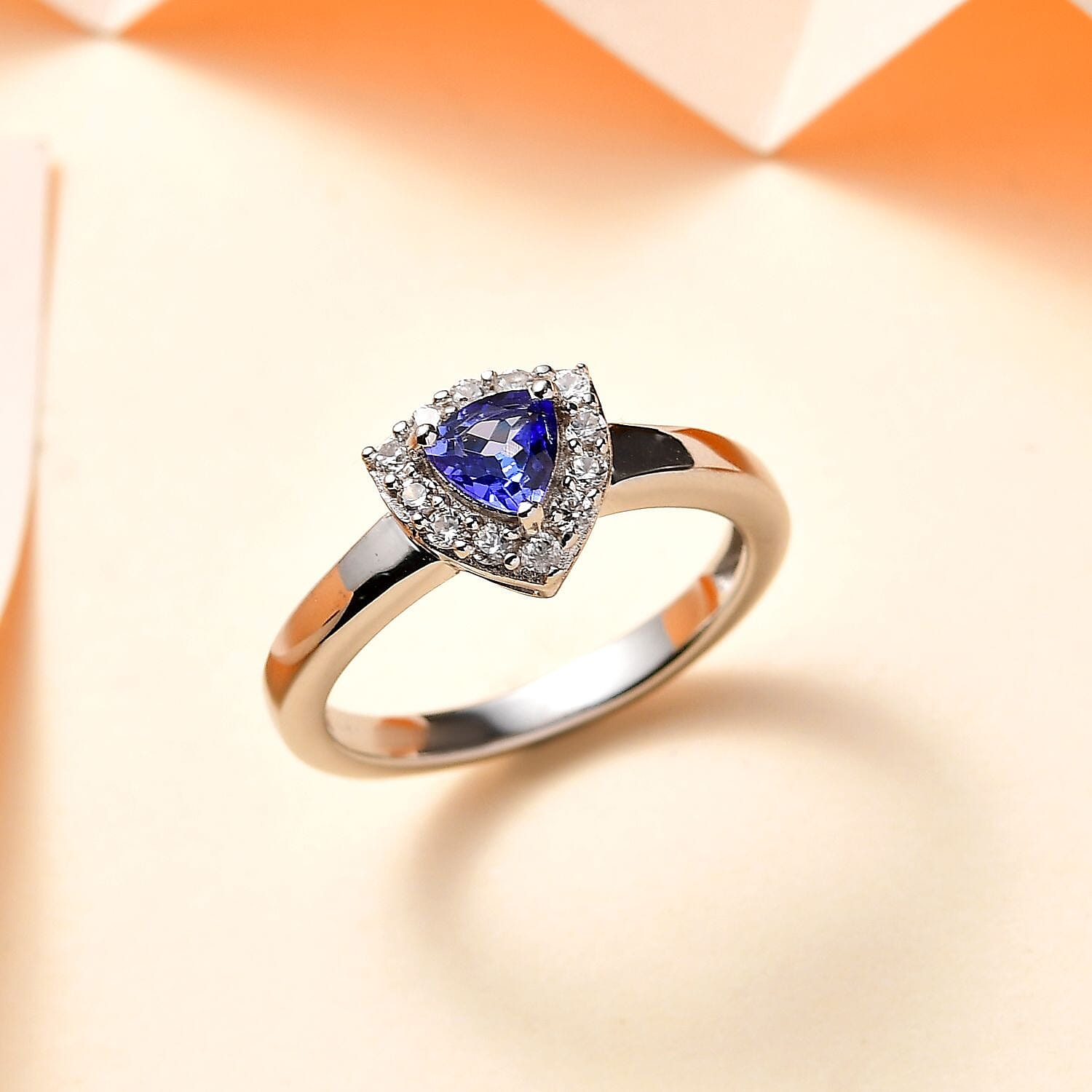 D'Joy AAA Tanzanite and Natural White Zircon Halo Ring in Platinum Over Sterling Silver (Size 10.0) 0.60 ctw