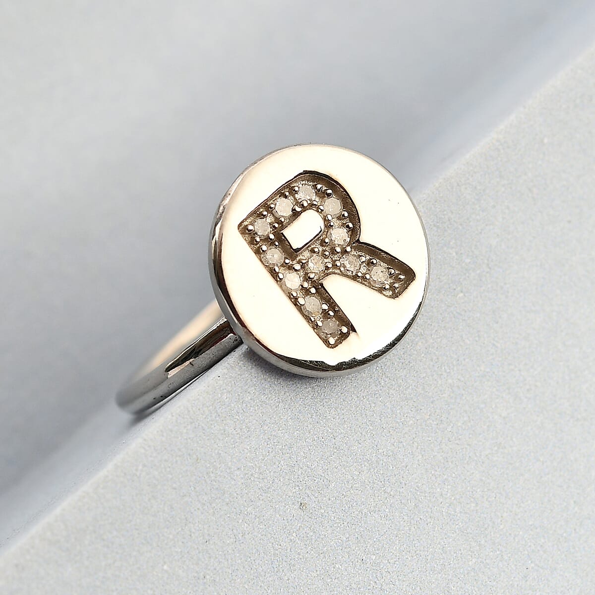 Diamond R Ring in Platinum Over Sterling Silver (Size 6.0) 0.08 ctw image number 1