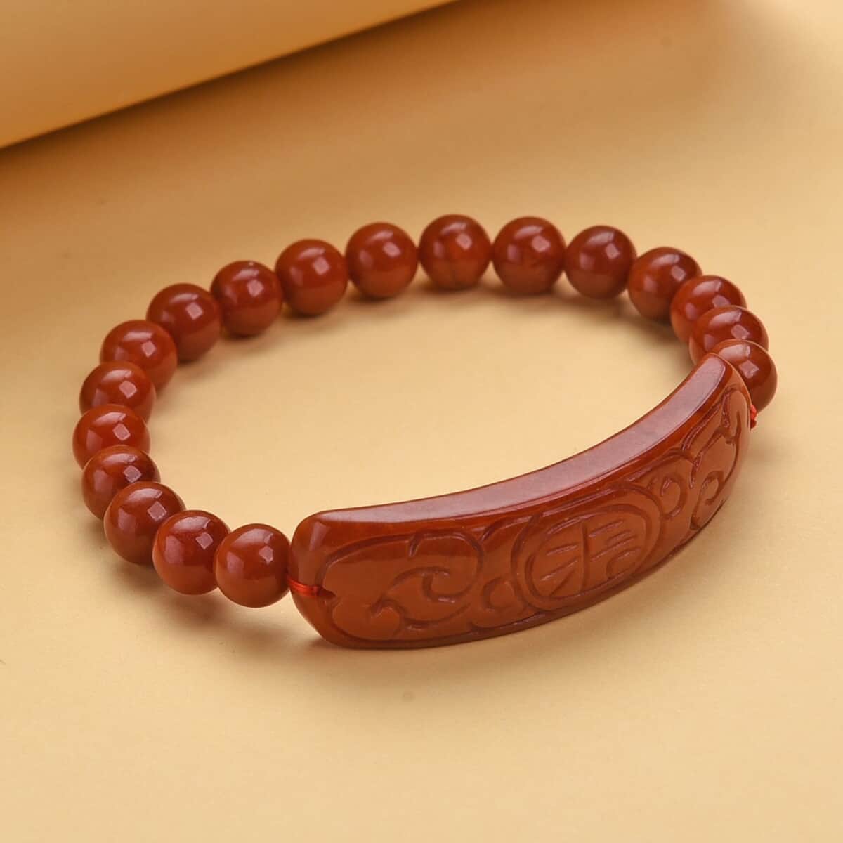 Red Jade (D) Bead Stretch Bracelet, Ancient Coin Detail Carved Bar Bracelet 150.00 ctw image number 1