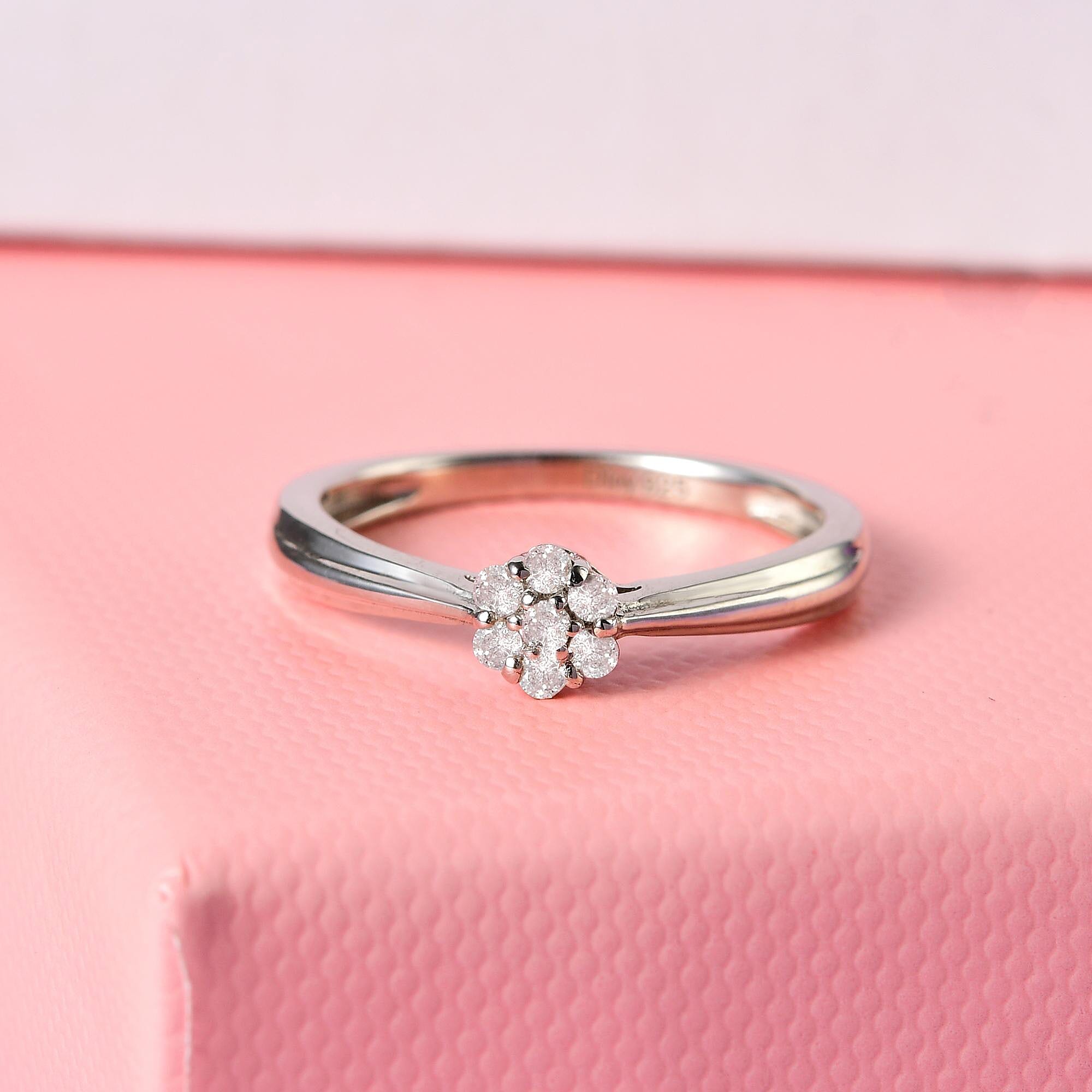 Diamond Floral Ring in Platinum Over Sterling Silver (Size 10.0) 0.10 ctw