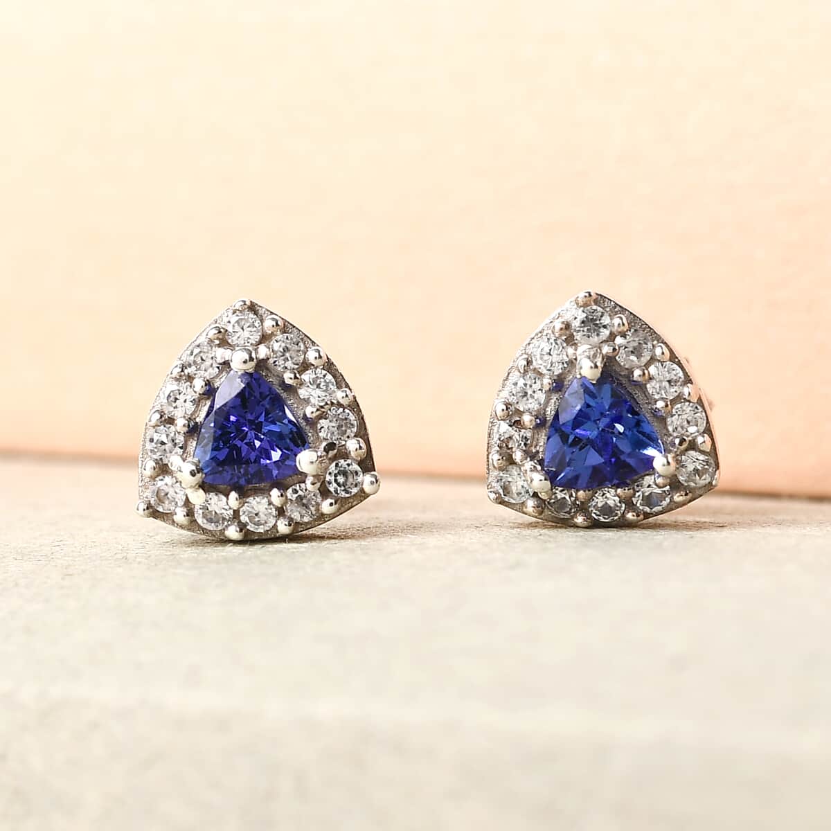 AAA Tanzanite and White Zircon Halo Stud Earrings in Platinum Over Sterling Silver 0.75 ctw image number 1