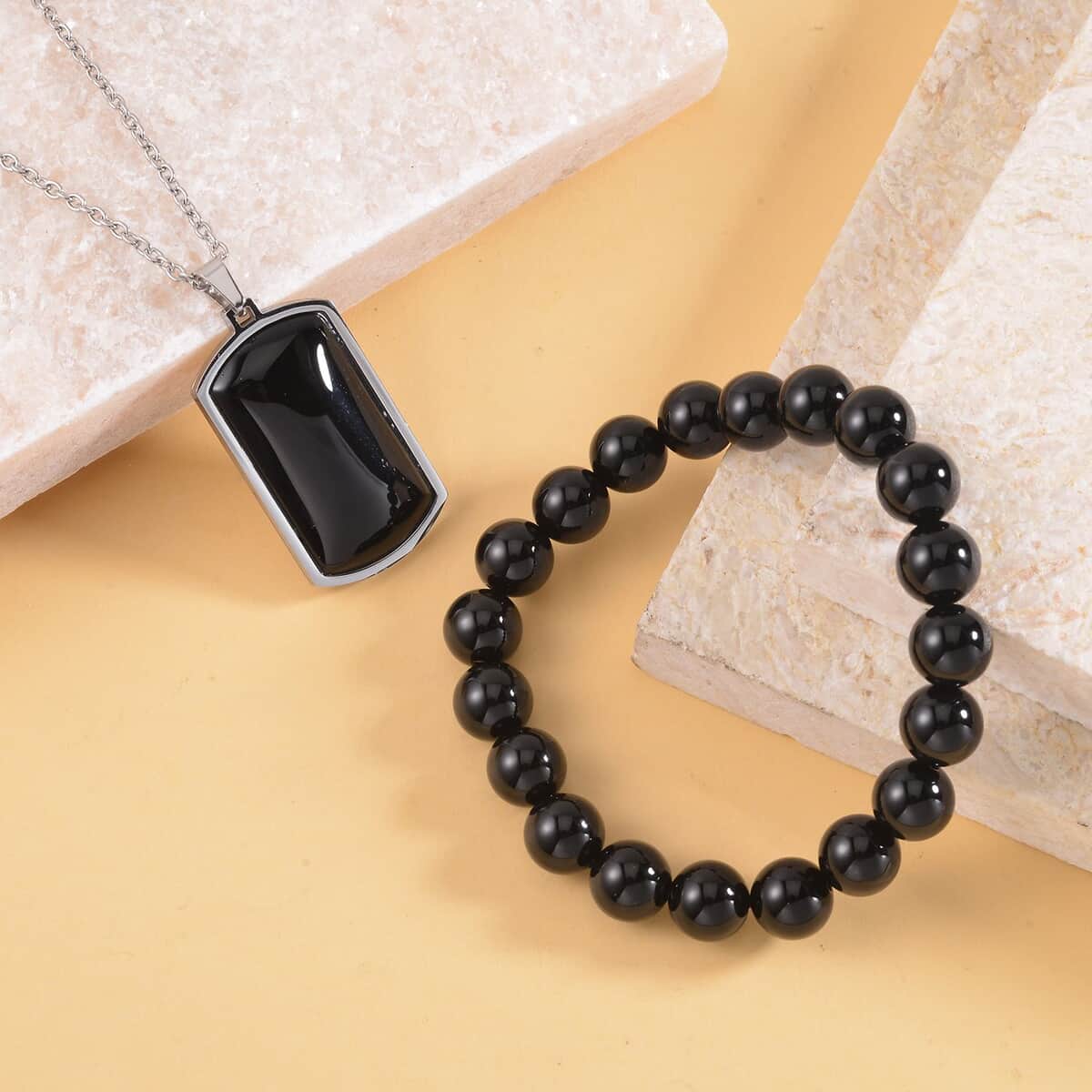 176.80 ctw Enhanced Black Agate Beaded Stretch Bracelet and Dog Tag Pendant Necklace (24.00 In) in Stainless Steel image number 1