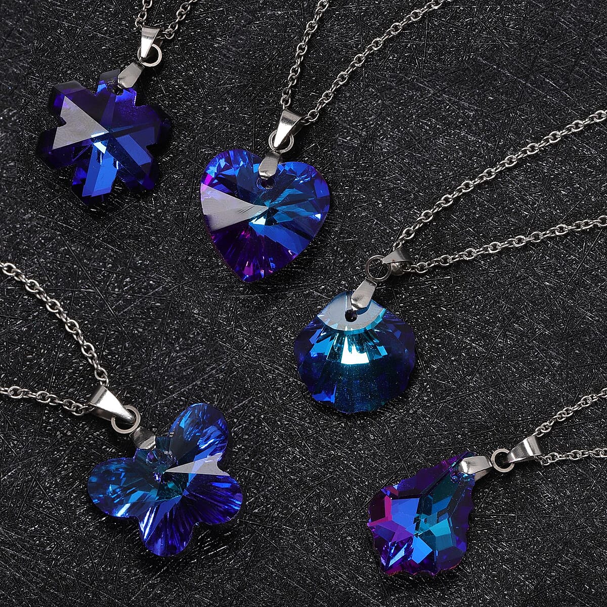 Set of 5 Blue Austrian Crystal Heart, Butterfly, Shell, Star, Heart and Fancy Shape Pendants Necklace 20-22 Inches in Silvertone image number 1