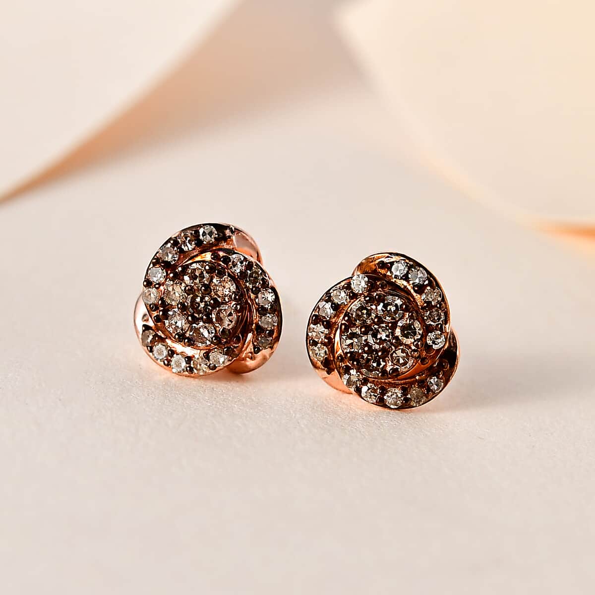 Natural Champagne Diamond 0.25 ctw Knotted Stud Earrings in Rhodium and Vermeil Rose Gold Over Sterling Silver image number 1