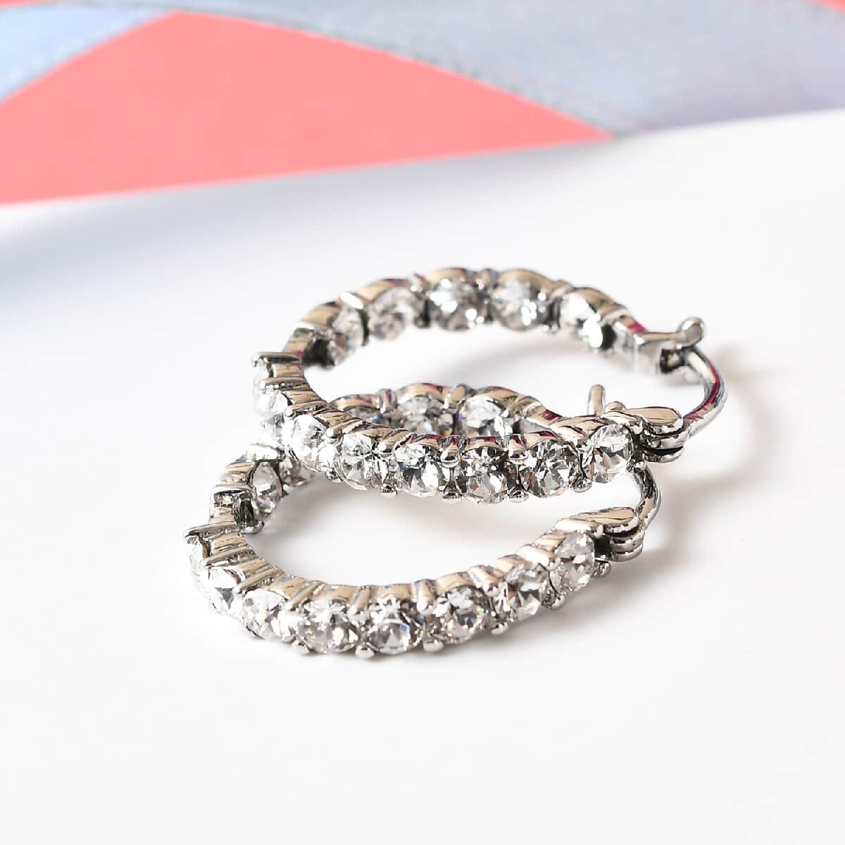 White Crystal Hoop Earrings in Stainless Steel image number 1