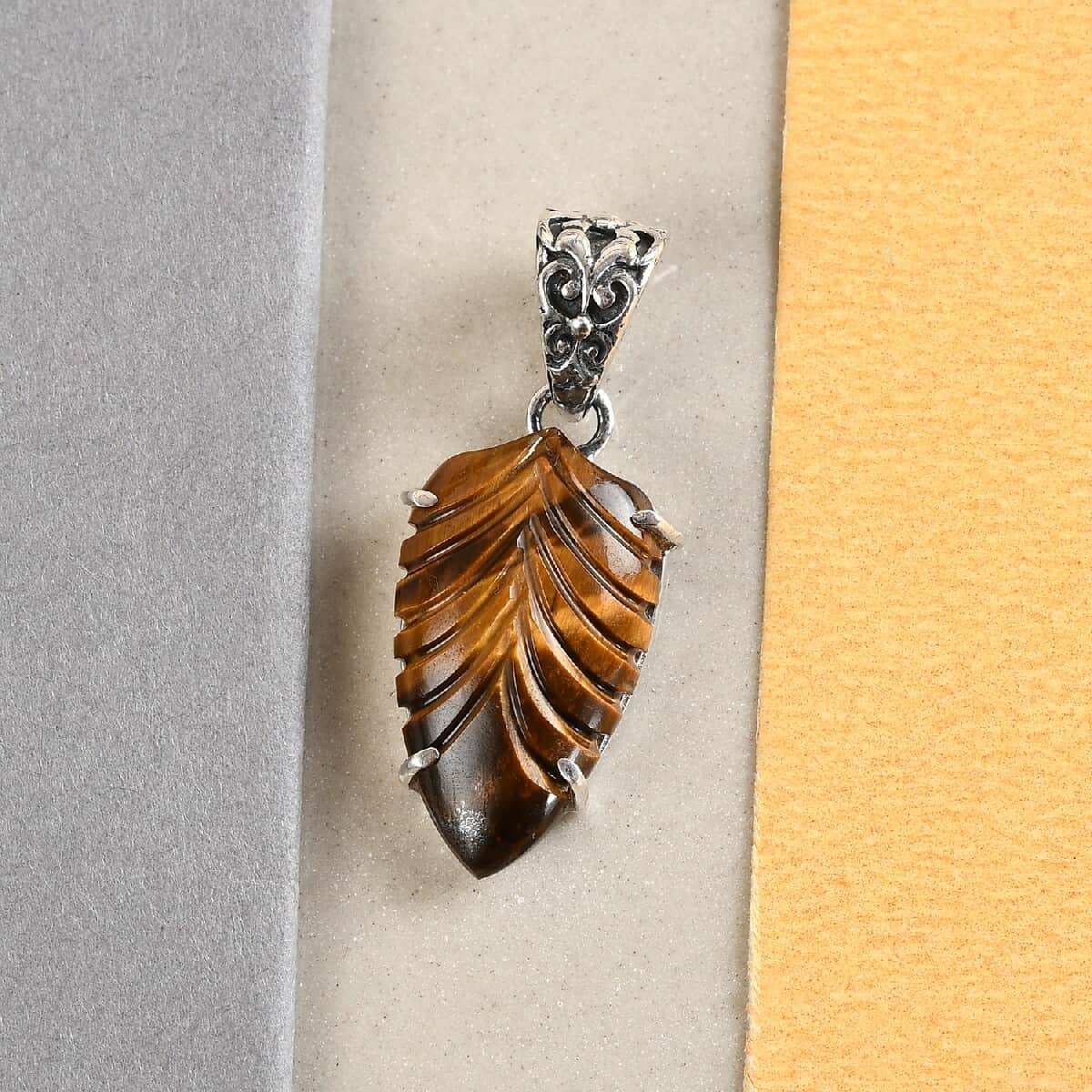 Tiger's Eye Carved Fancy Pendant in Sterling Silver 10.75 ctw image number 1