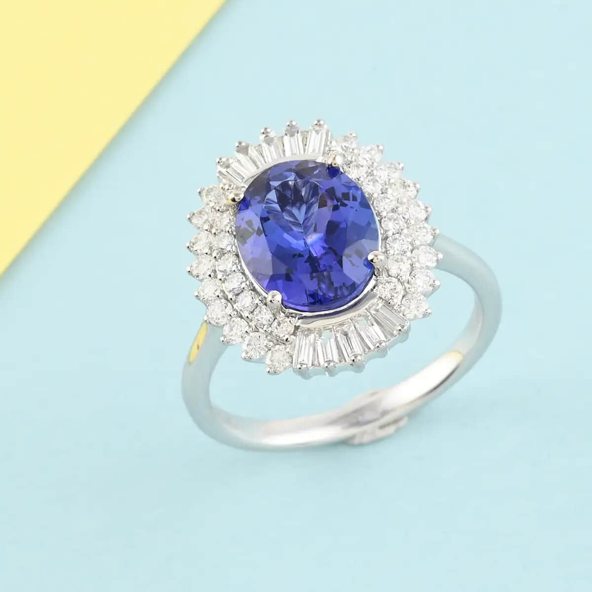 RHAPSODY 950 Platinum AAAA VIVID Tanzanite, Diamond (E-F, VS) (0.65 cts) Double Halo Ring (Size 8.0) (6.85 g) 4.00 ctw image number 1