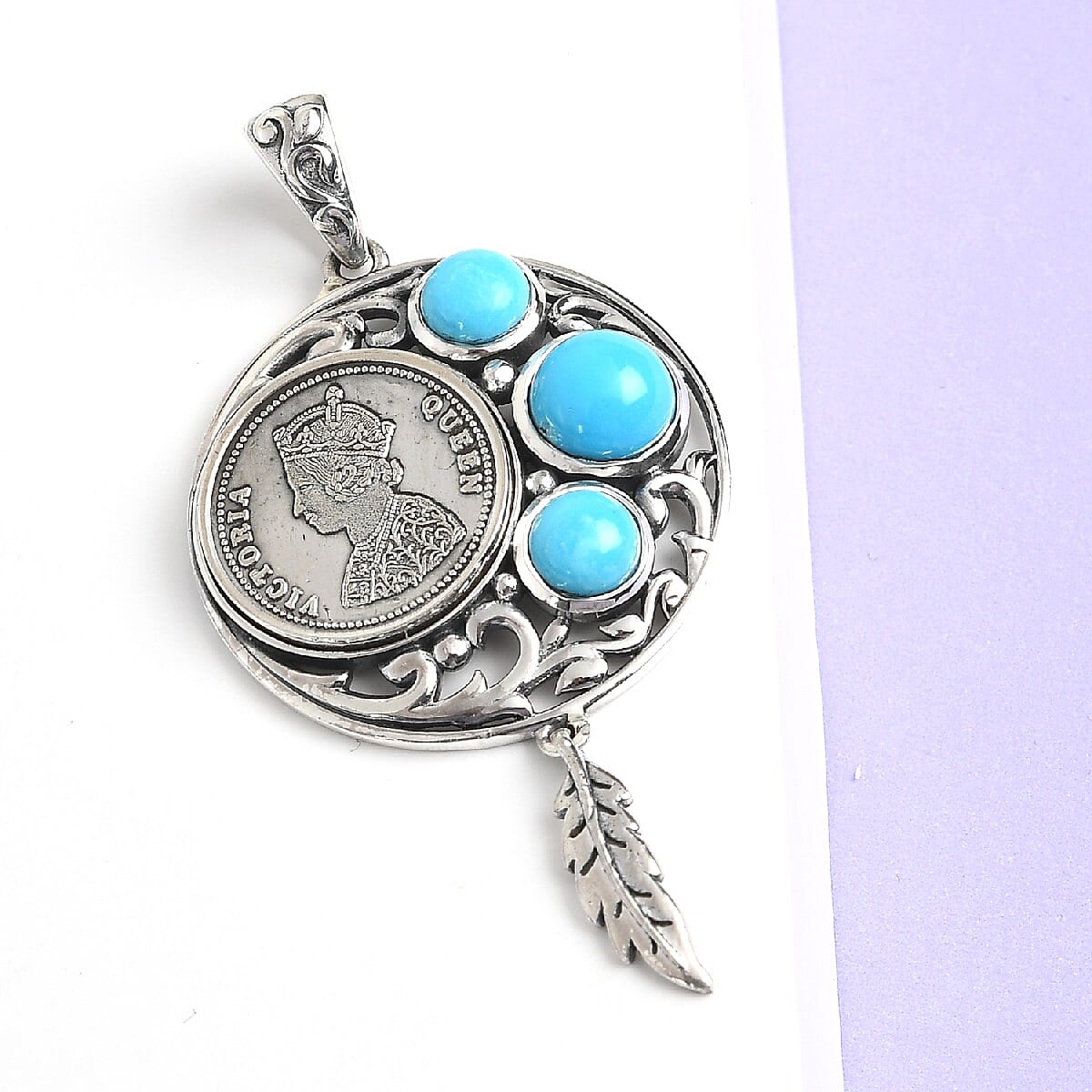 Sleeping Beauty Turquoise Queen Victoria Coin and Feather Pendant in Sterling Silver 2.80 ctw image number 1