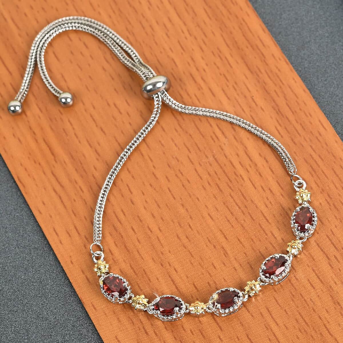 Karis 2.75 ctw Mozambique Garnet Bolo Bracelet in ION Plated 18K YG & Platinum Bond and Stainless Steel image number 1