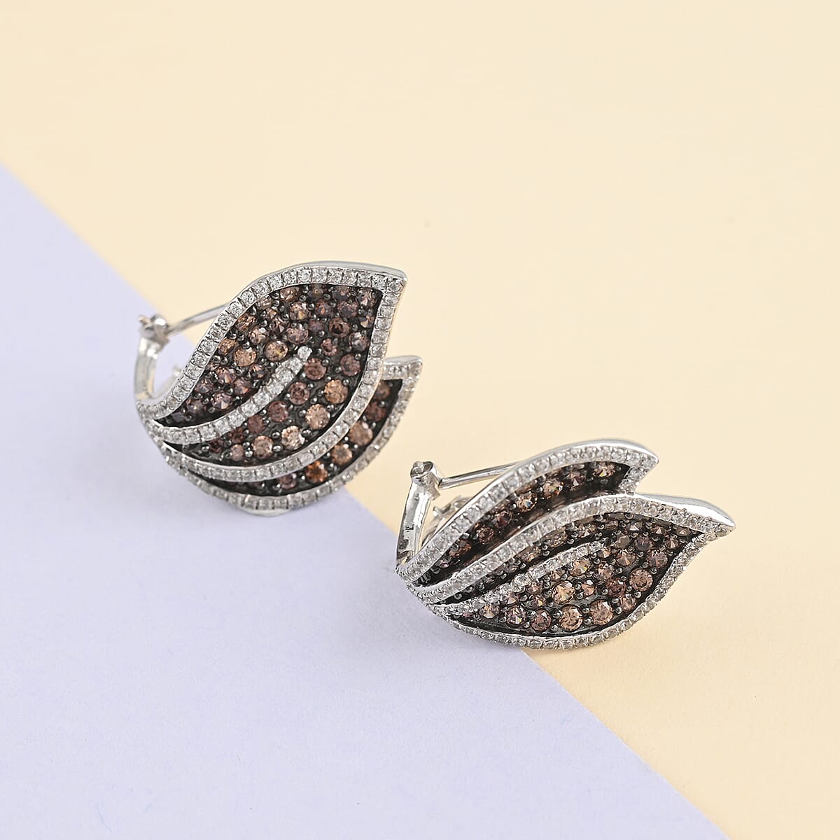 Simulated Champagne Diamond and Simulated White Diamond Earrings in Platinum Over Sterling Silver image number 1