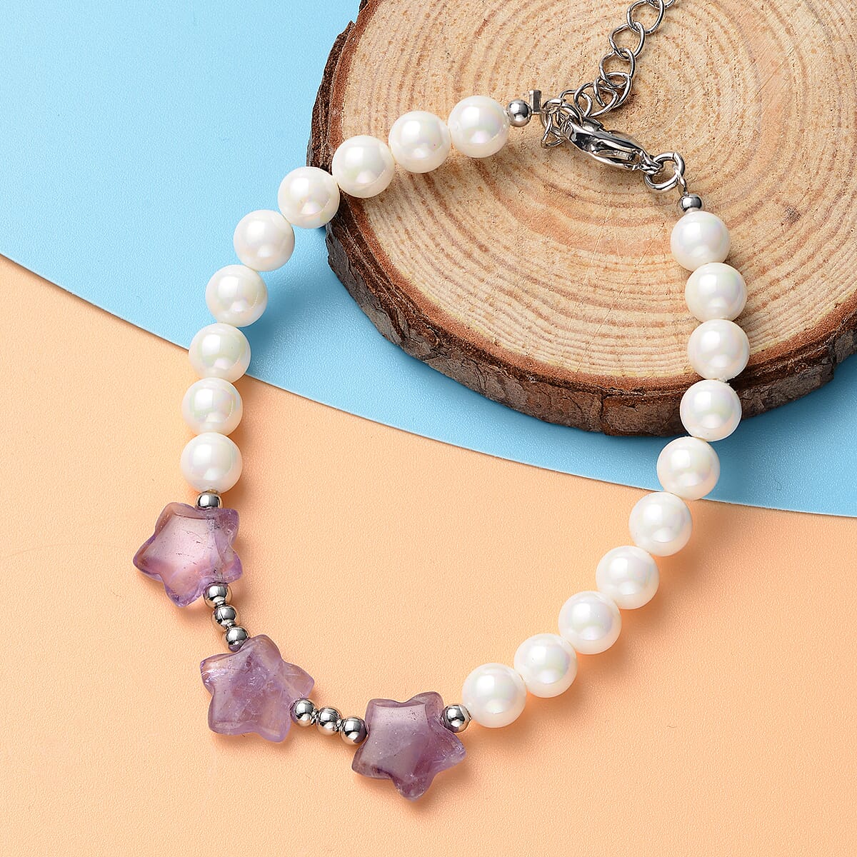 Amethyst 10.50 ctw and White Shell Pearl Orion Belt Theme Bracelet in Stainless Steel (7.50 In) image number 1